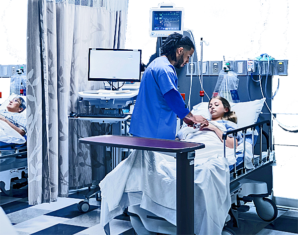 a nurse tends to patients